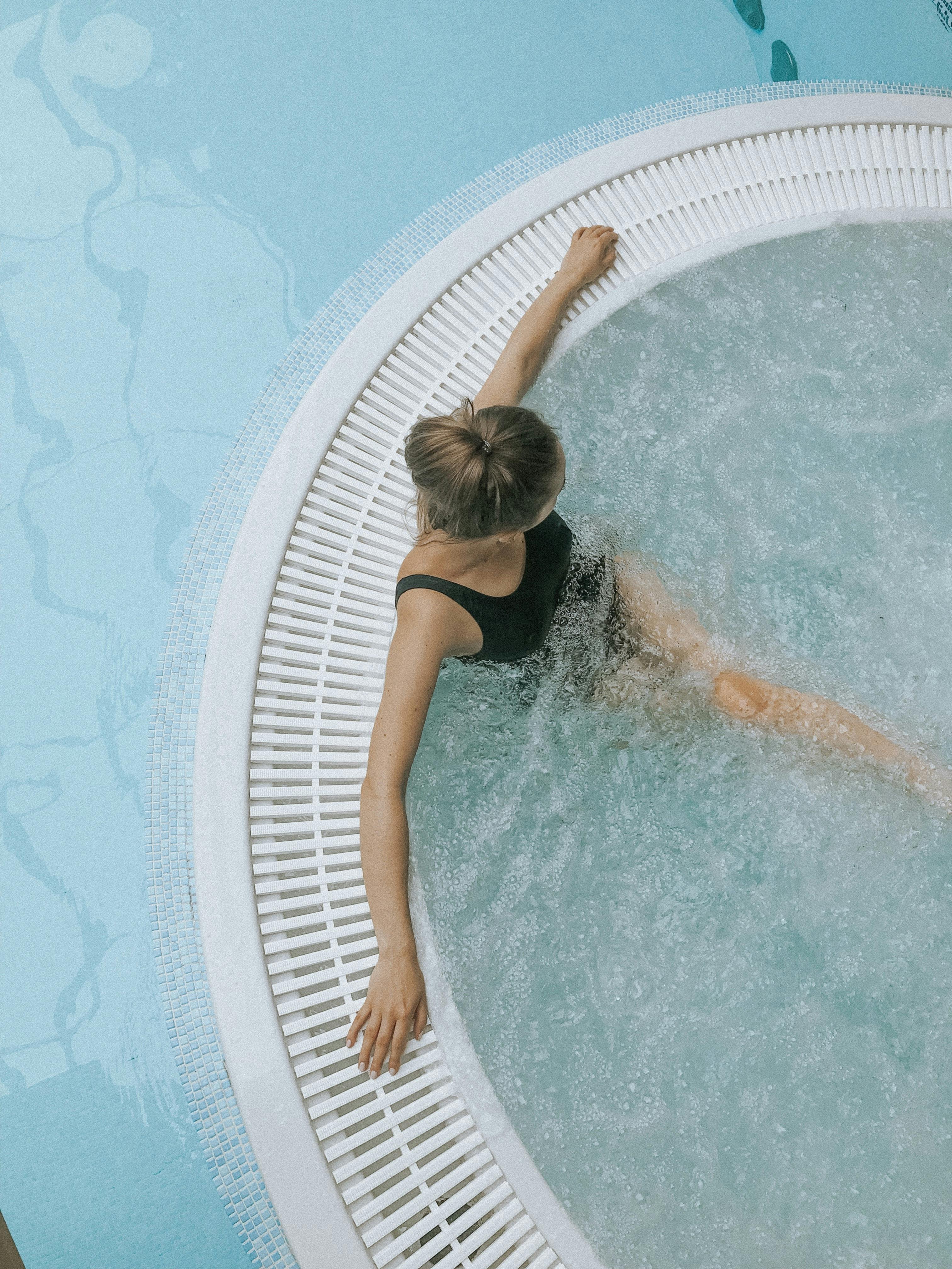 Combine hydrotherapy with exercise by incorporating easy exercise moves into your hot tub experience.